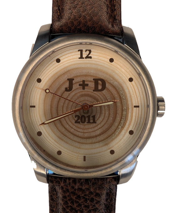 Tree ring dial with 15 rings, year 2011 and initials