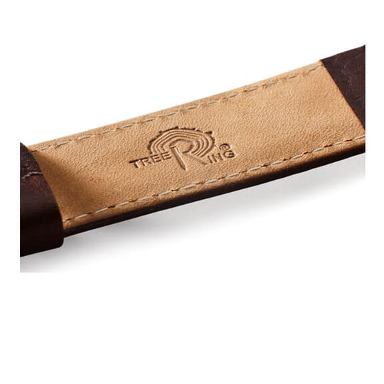 Close-up of a Tree Ring watch strap with embossed logo, showcasing quality craftsmanship and unique design.