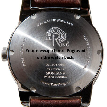 Custom engraving on the back of a Douglas-Fir wood dial watch, featuring a message placeholder.