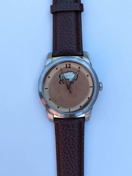 Colorado Bison gift watch featuring Mother of Pearl inlay and wood dial, showcasing unique tree rings.
